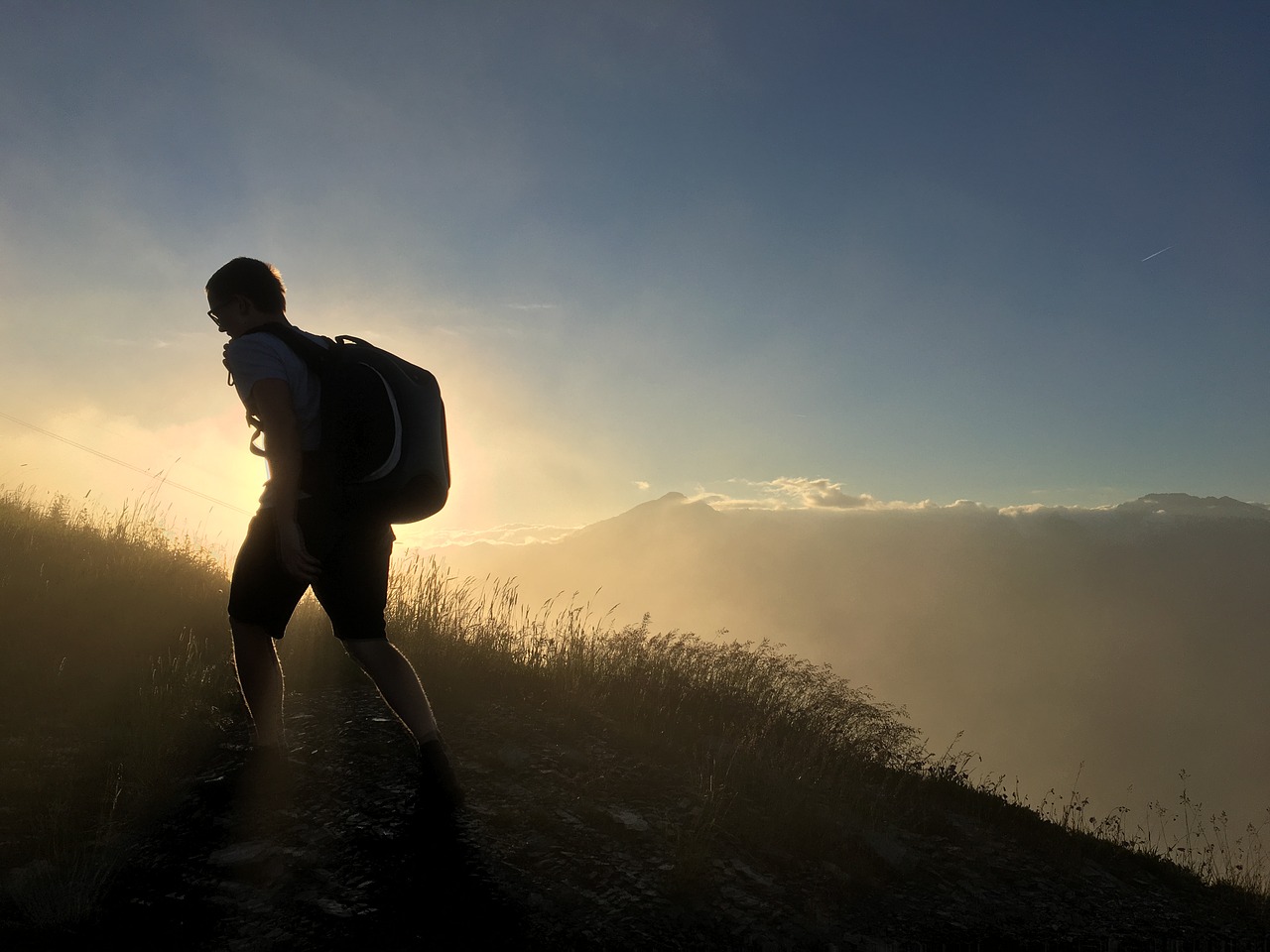 mountain silhouette man free photo