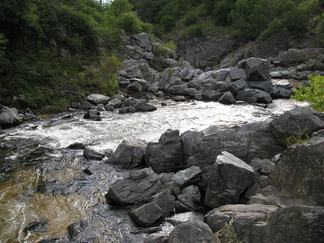 mountain river between mountains rocks free photo