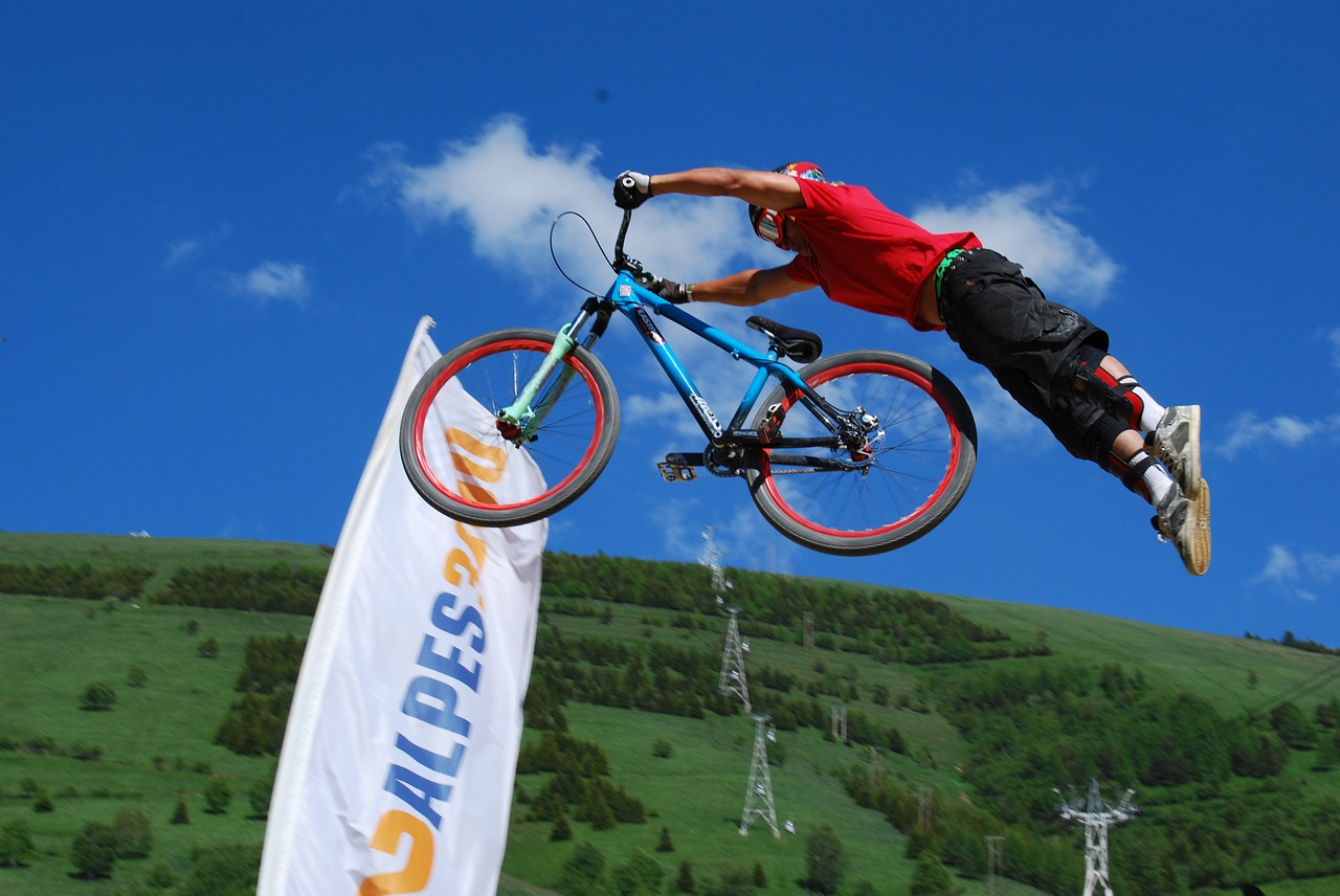 mountain biking jump acrobatics free photo