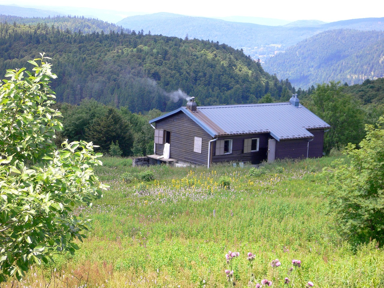 mountain hut mountains valleys free photo