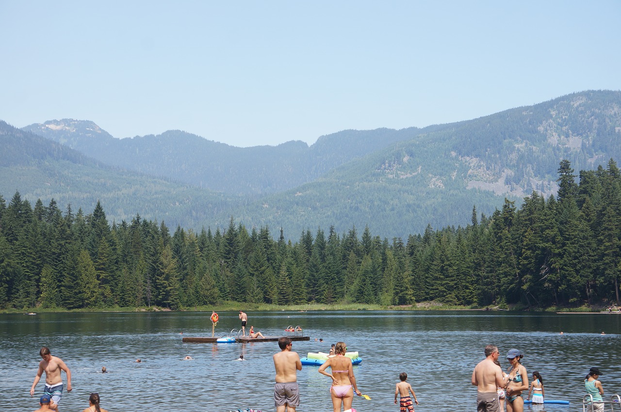 mountain lake swimming summer free photo