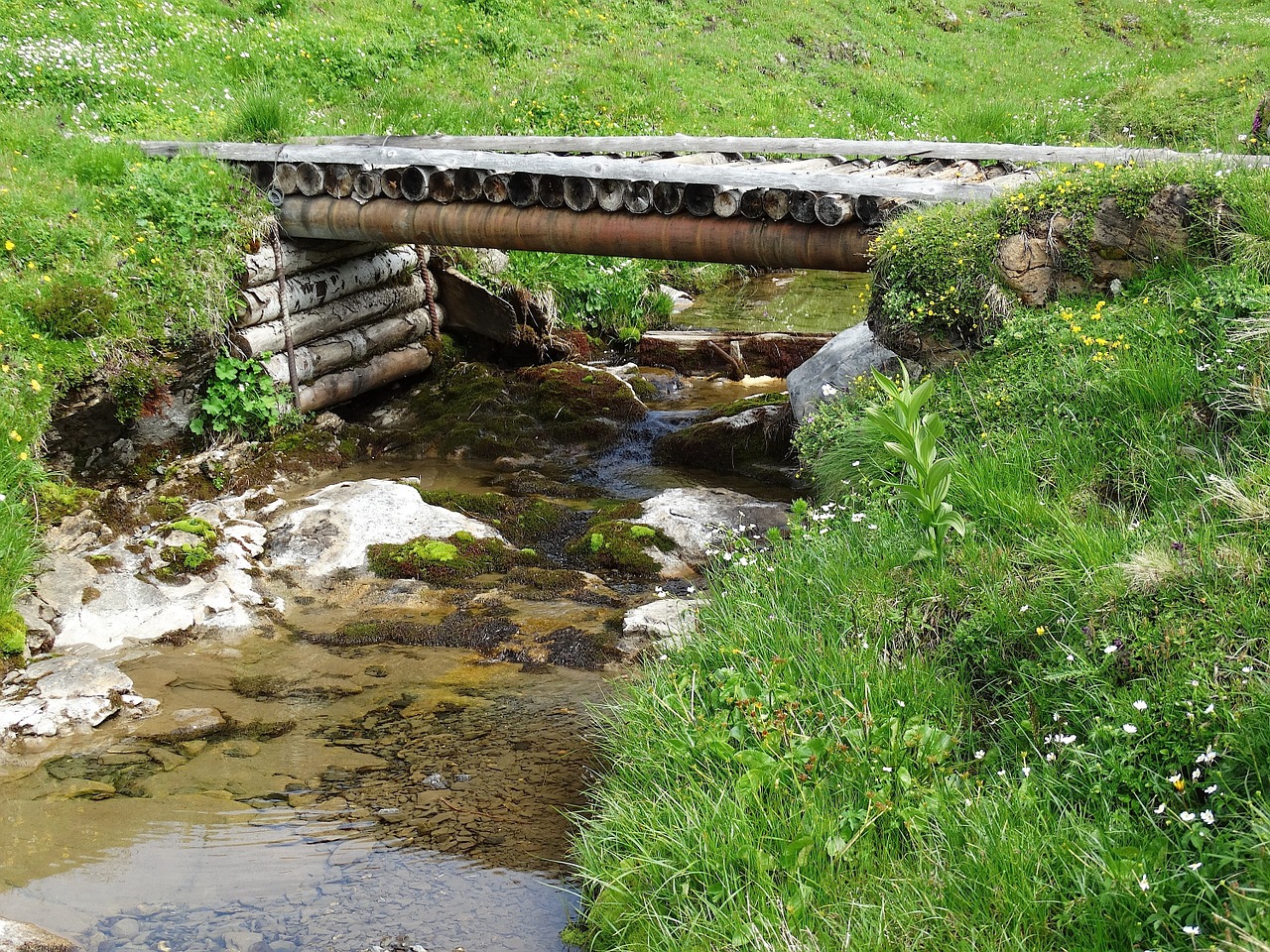 mountain stream bridge wooden bridge free photo