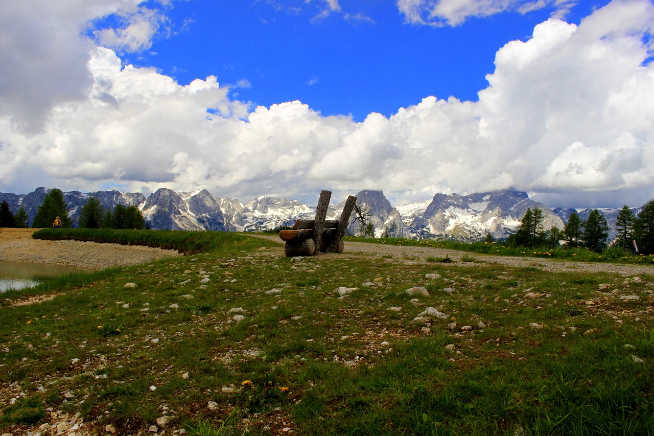 mountains clouds wooden bench free photo