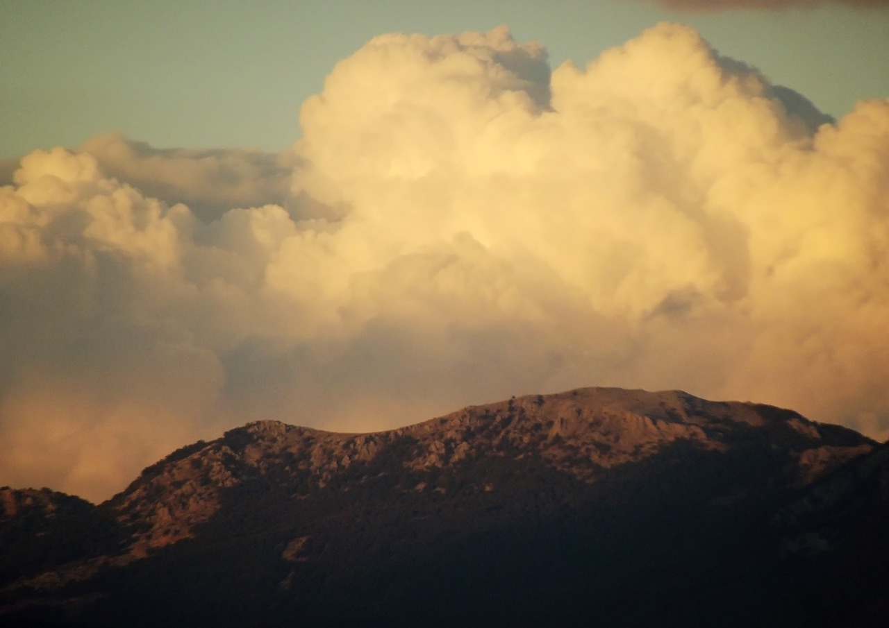 mountains the rocks clouds free photo