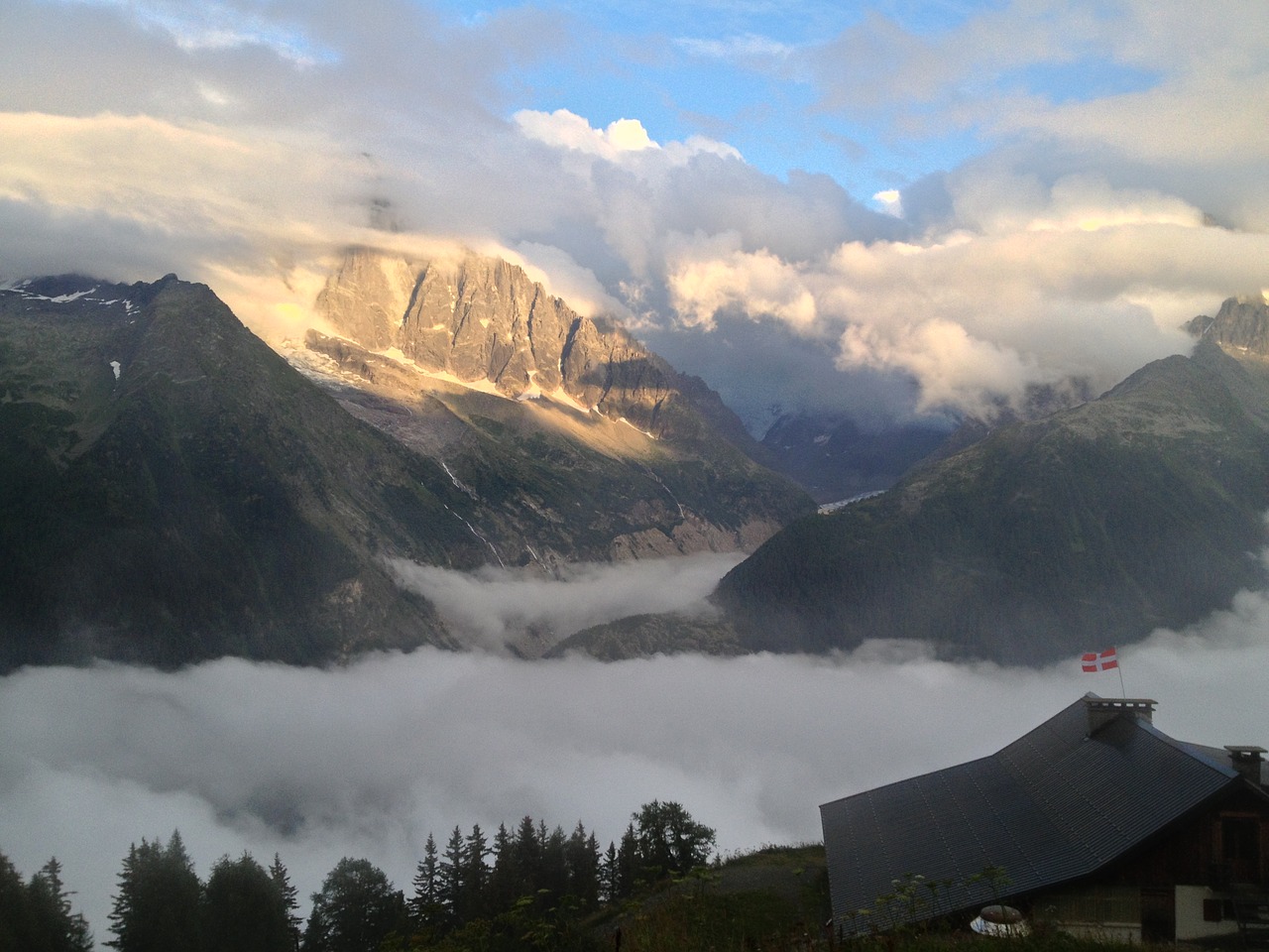 mountains clouds switzerland free photo