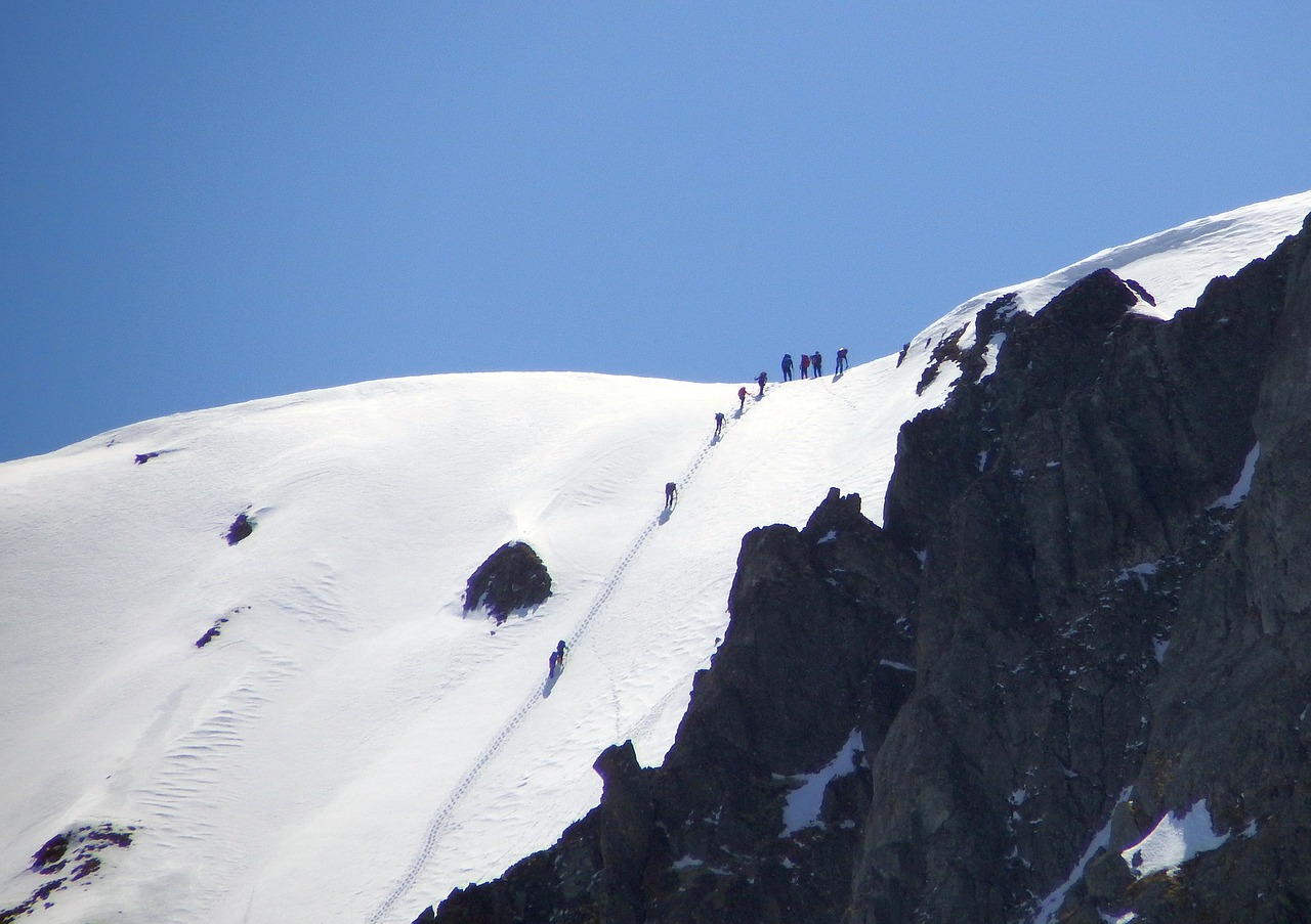 mountains climbing skiers free photo