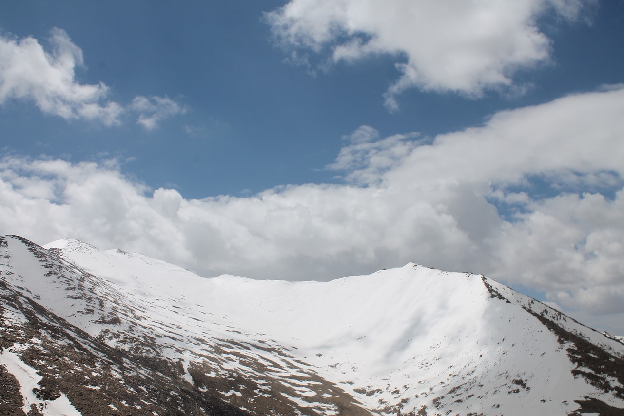 mountains snow clouds free photo