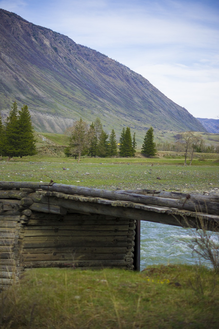 mountains wooden bridge river free photo