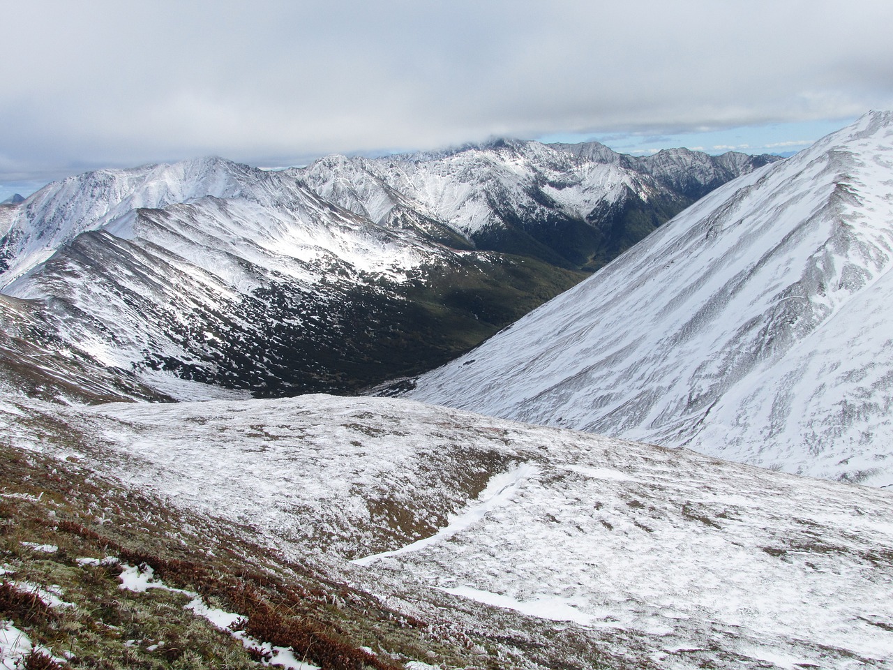 mountains height the first snow free photo