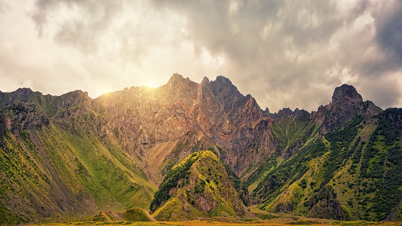 mountains  caucasus  sun free photo