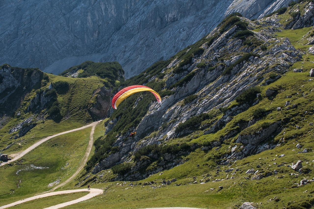 mountains  parachutist  parachute free photo