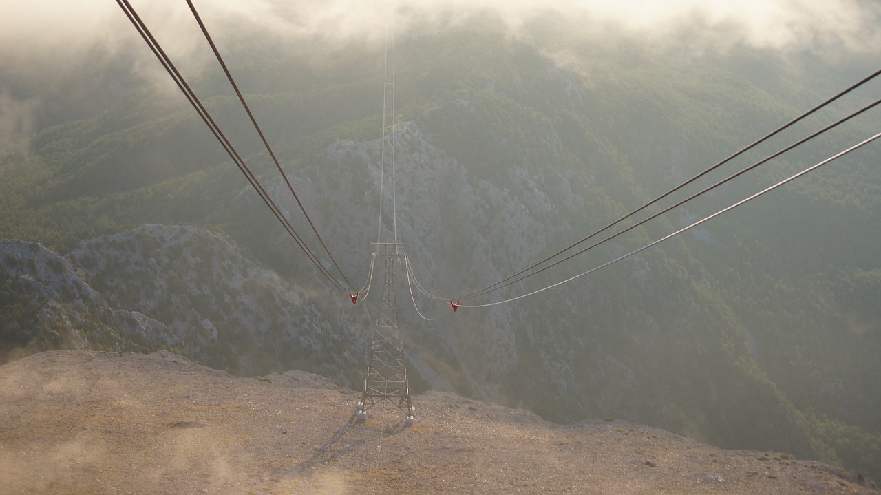 mountains  cable car  fog free photo