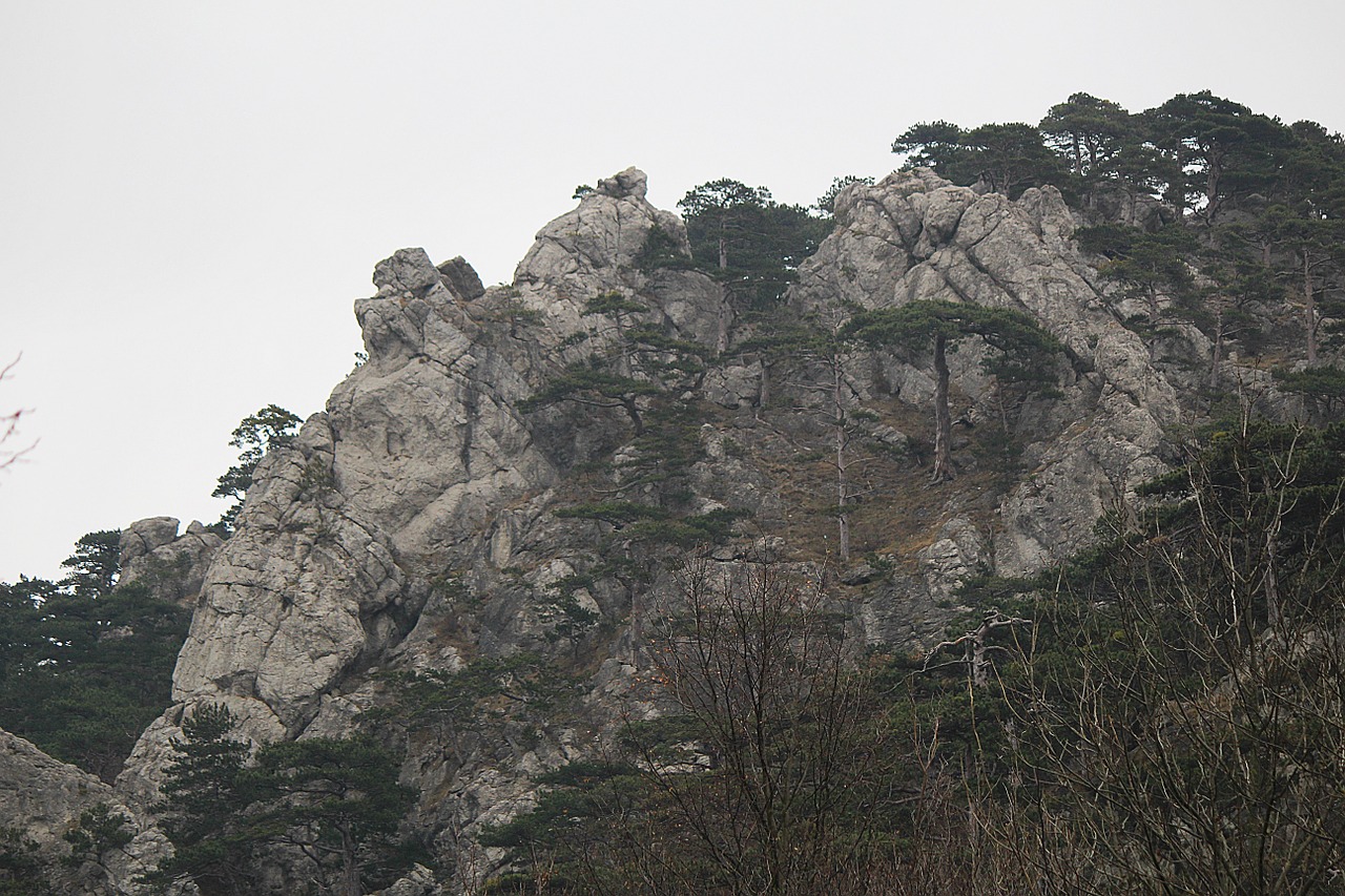 mountains rock rock wall free photo