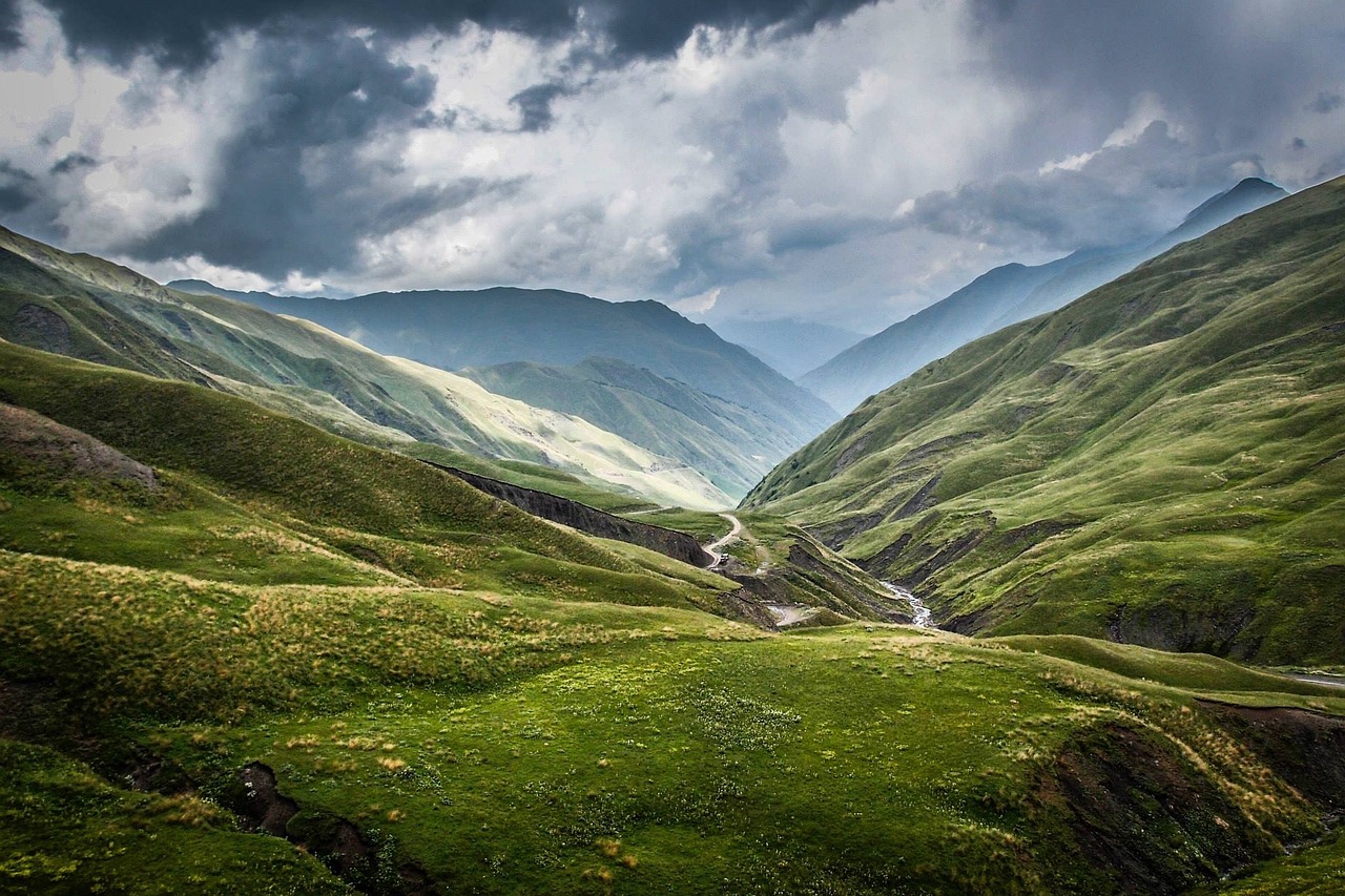 mountains green meadow free photo