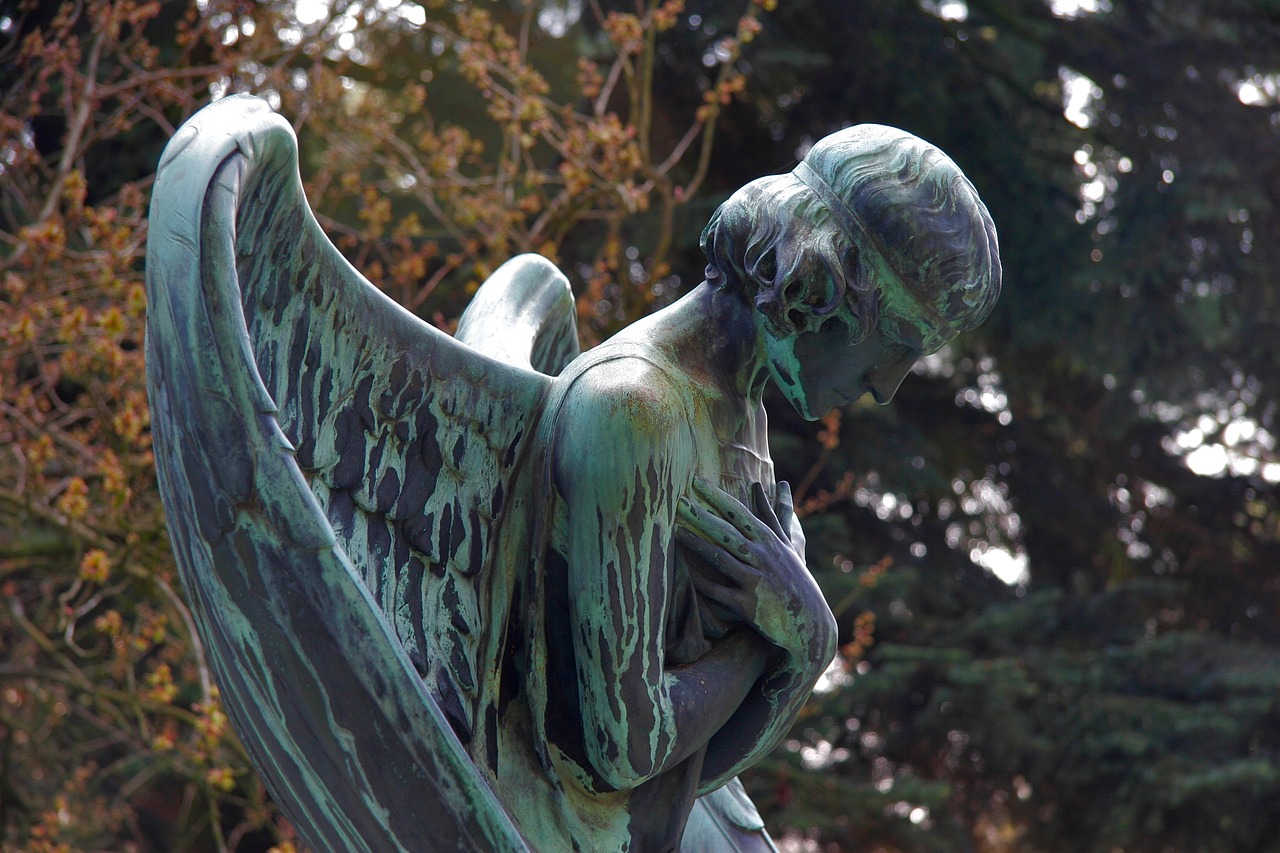 mourning angel sculpture free photo