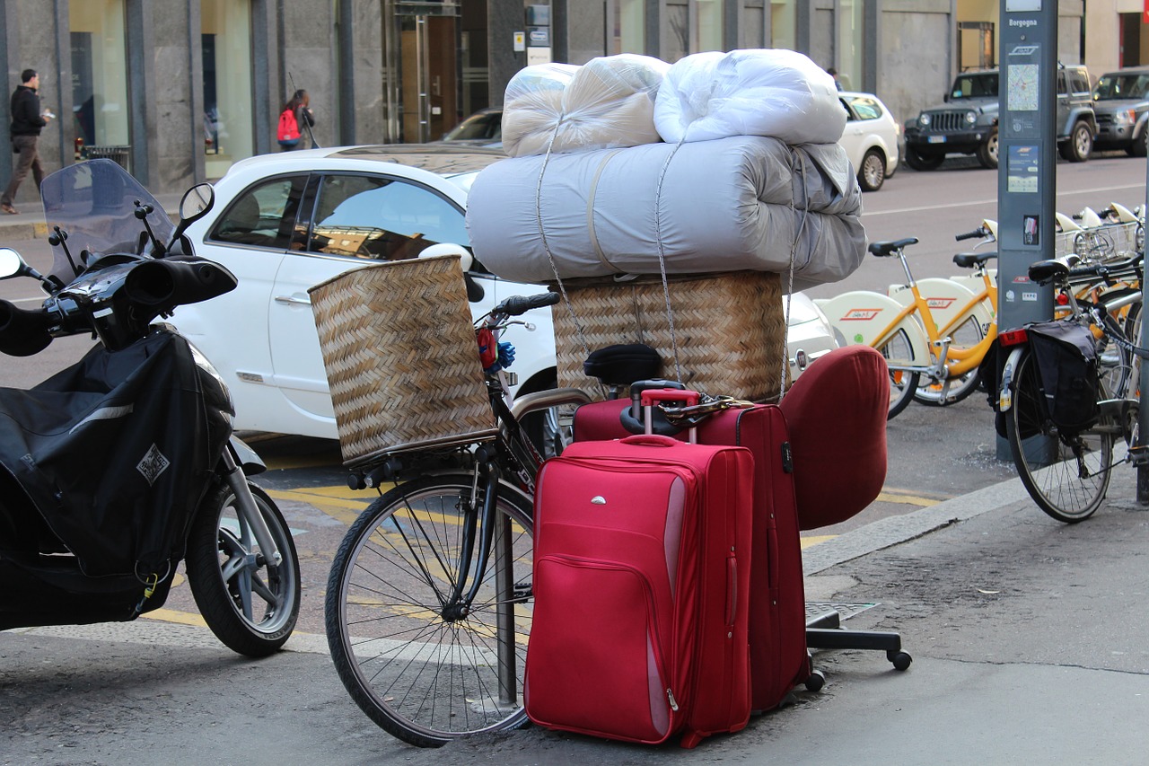 moving by bike removal suitcases free photo