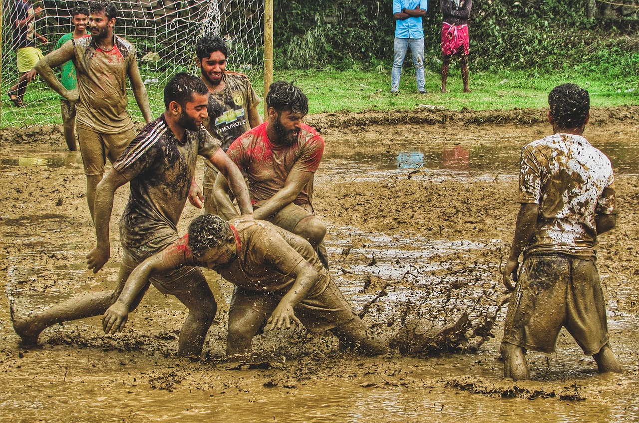mud football kerala monsoon free photo