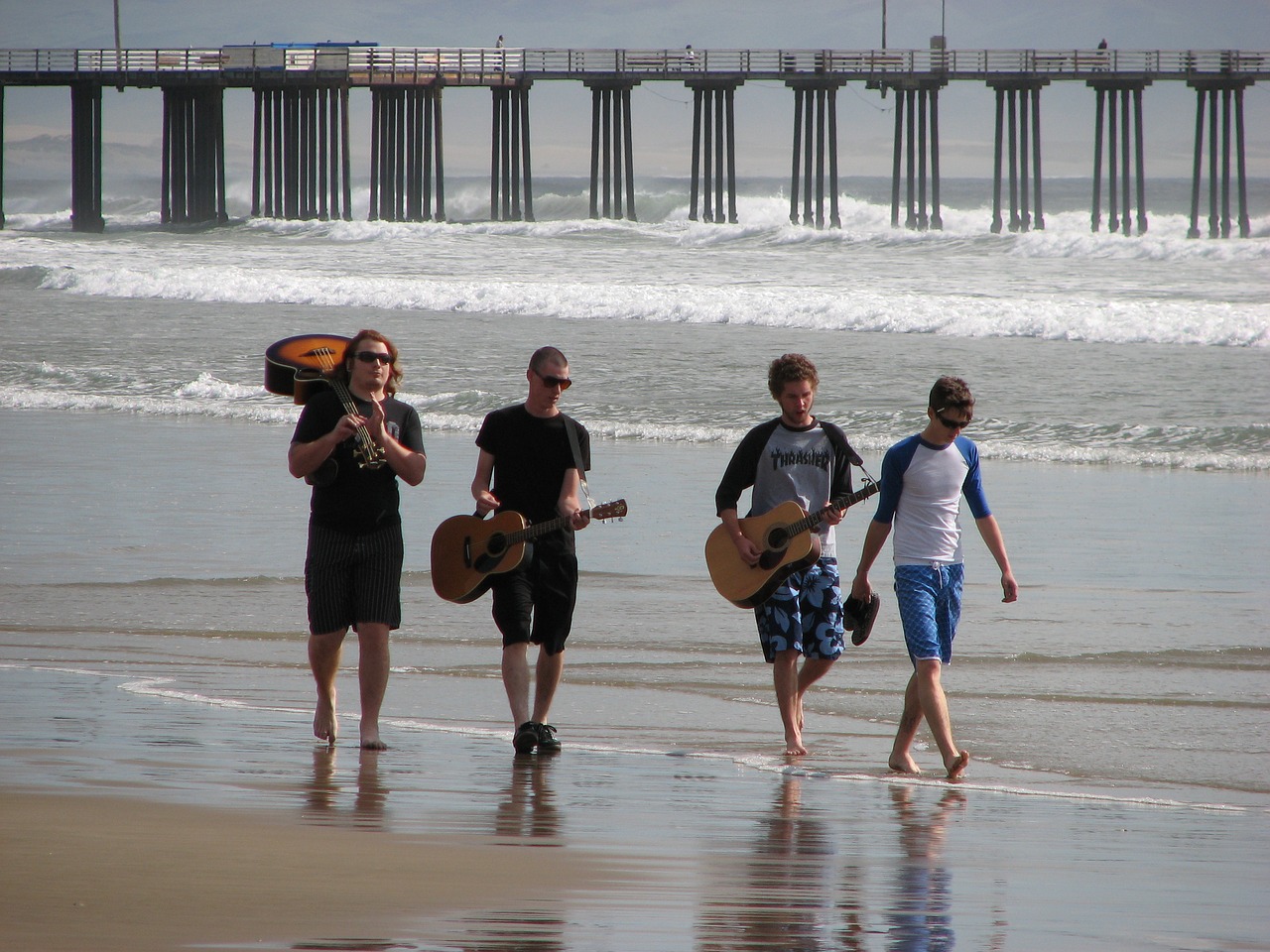 musicians on the beach music band instrument free photo