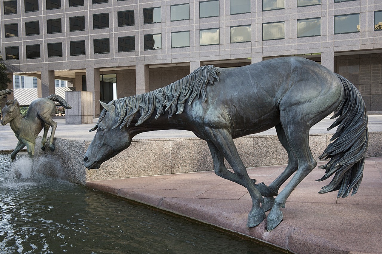 mustangs sculpture fountain free photo