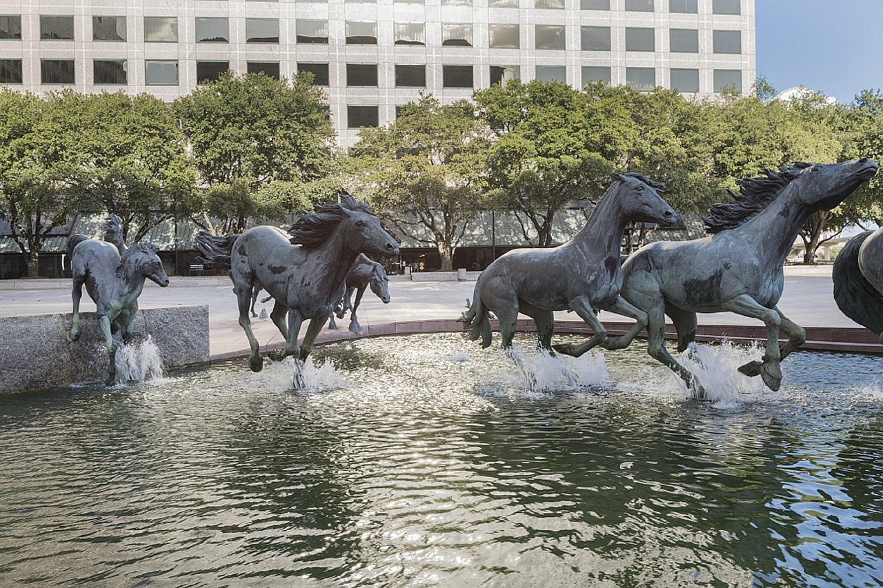 mustangs sculpture fountain free photo