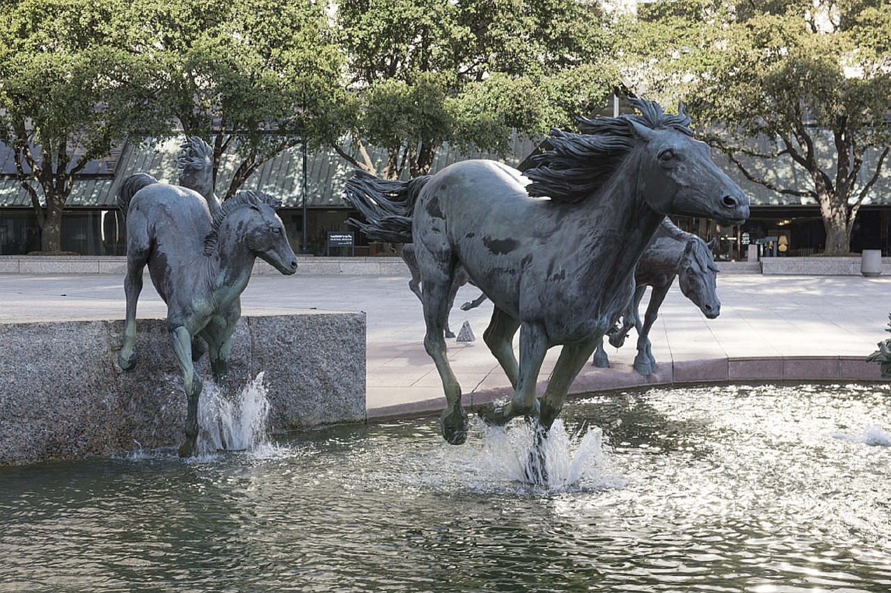 mustangs sculpture fountain free photo