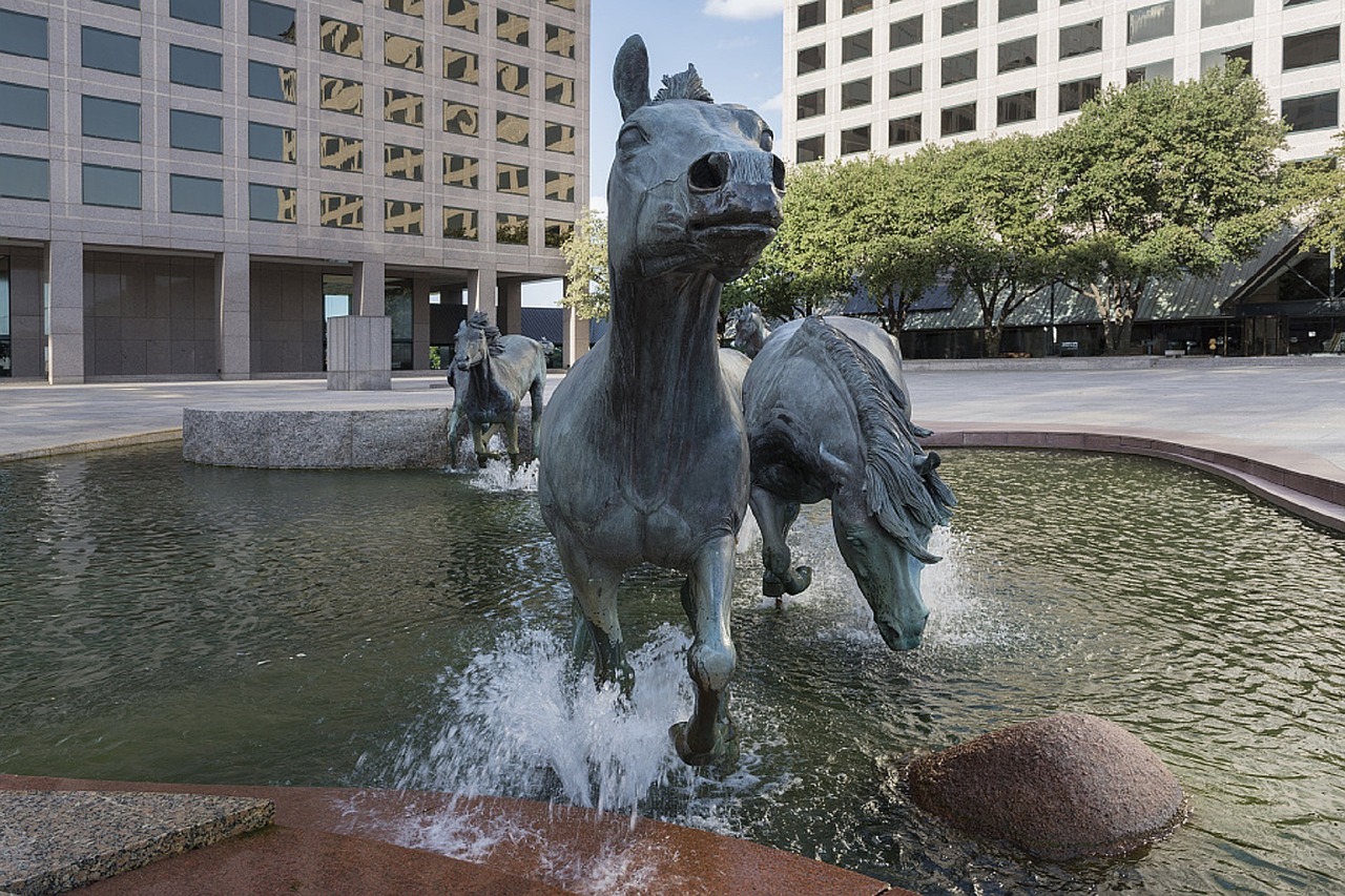 mustangs sculpture fountain free photo