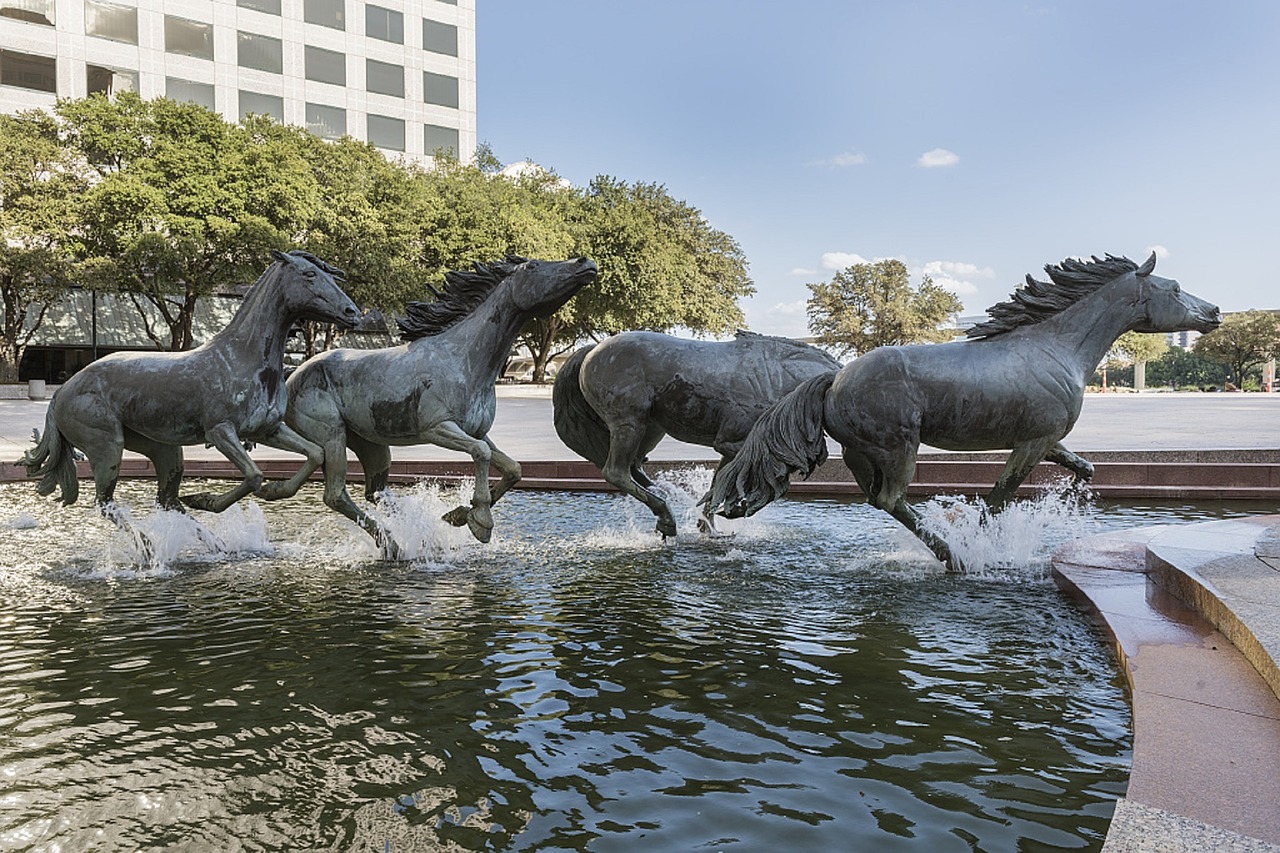 mustangs sculpture fountain free photo