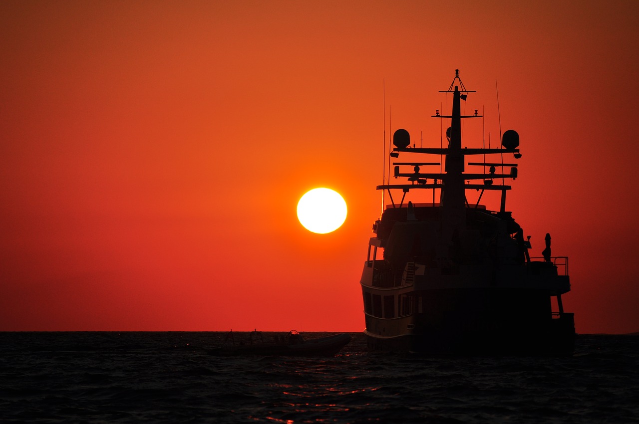 sunset ship silhouette free photo