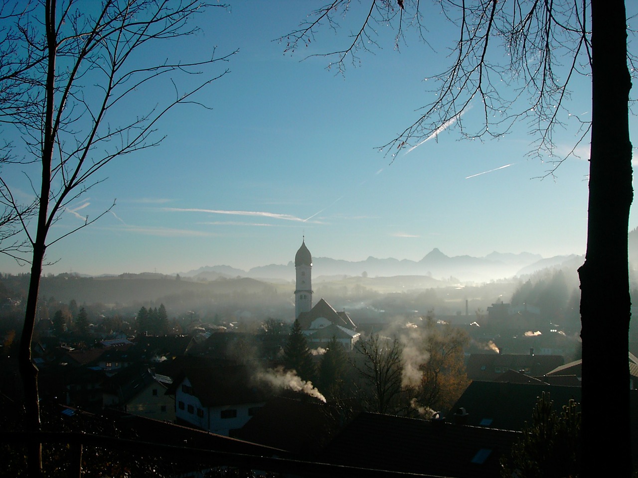 nesselwang in the haze allgäu bergpanorame with säuling free photo
