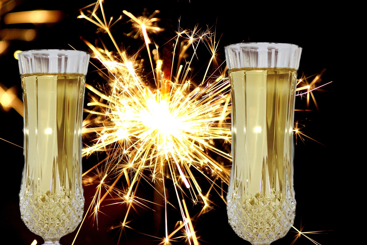 new year's eve champagne glasses sparkler free photo