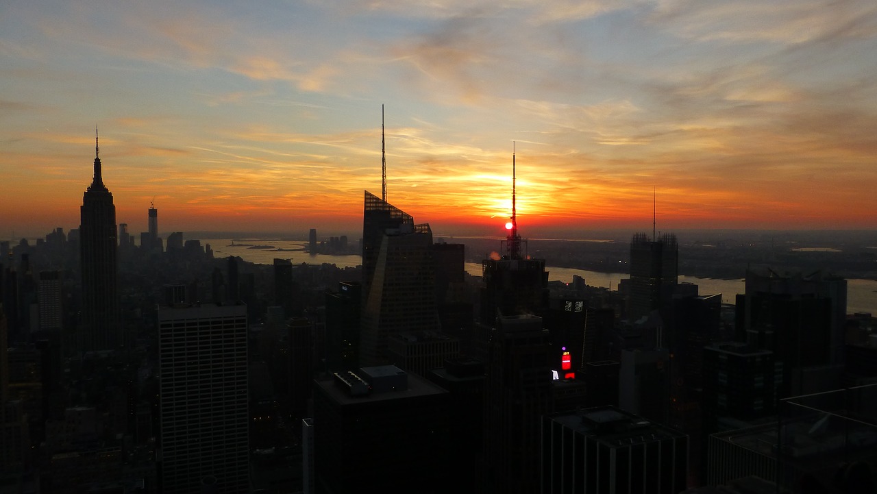 new york city sunset skyscrapers free photo