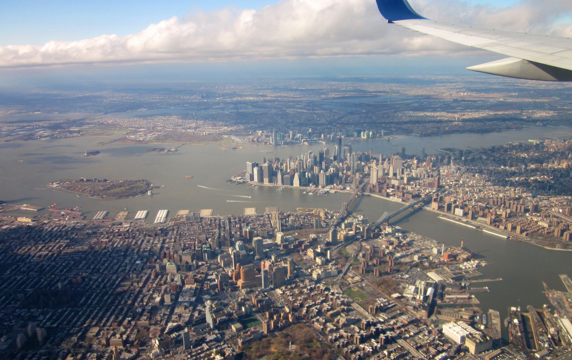 flying airplane new york city free photo