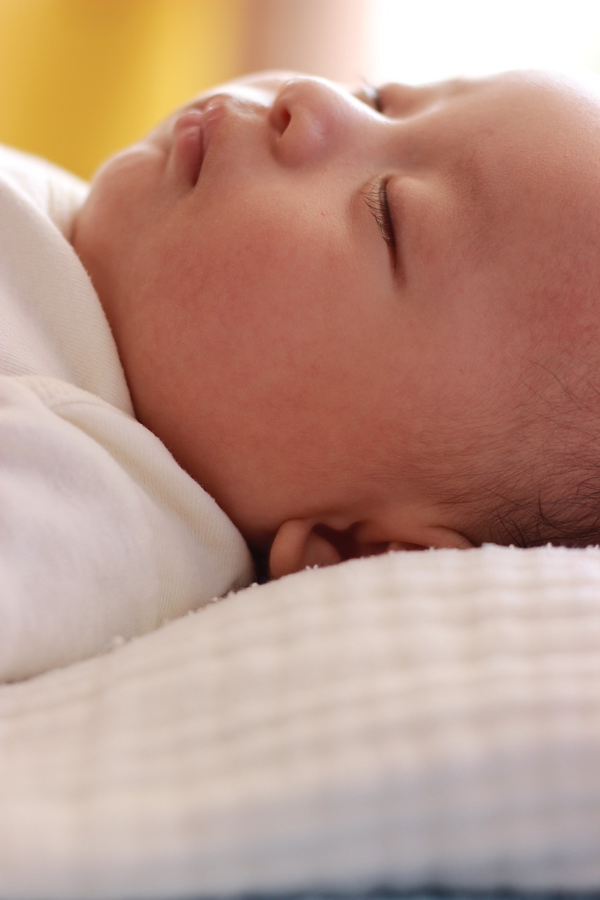 newborn sleeping child free photo