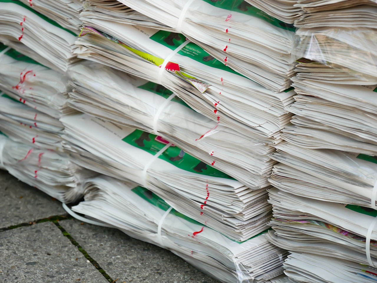 newspaper pile stack free photo