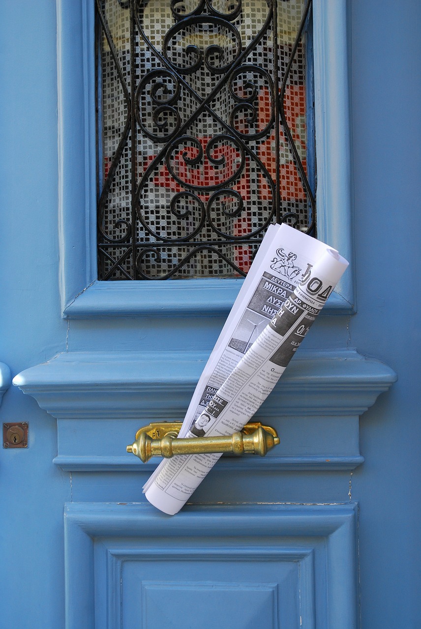 newspaper blue door paper free photo