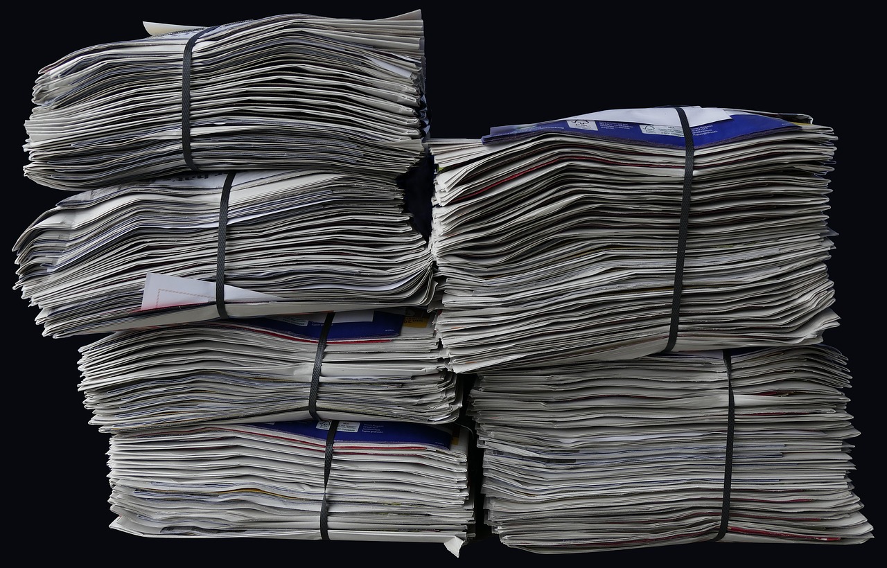 newspapers brochures stack free photo