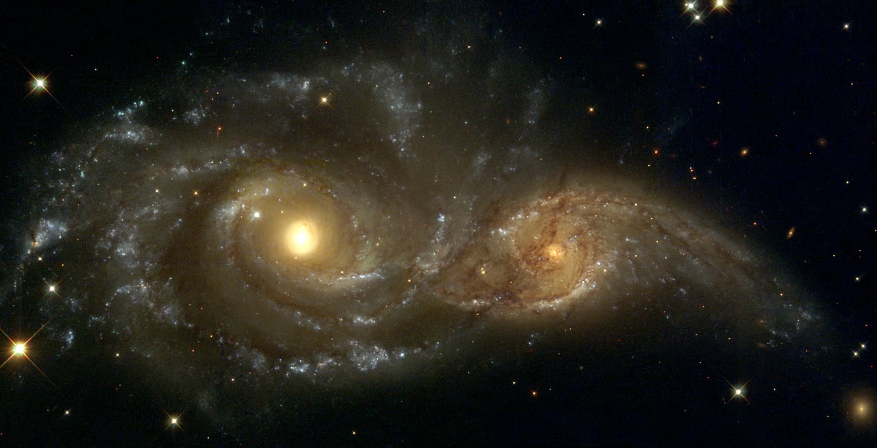 ngc 2207 spiral galaxy light year free photo