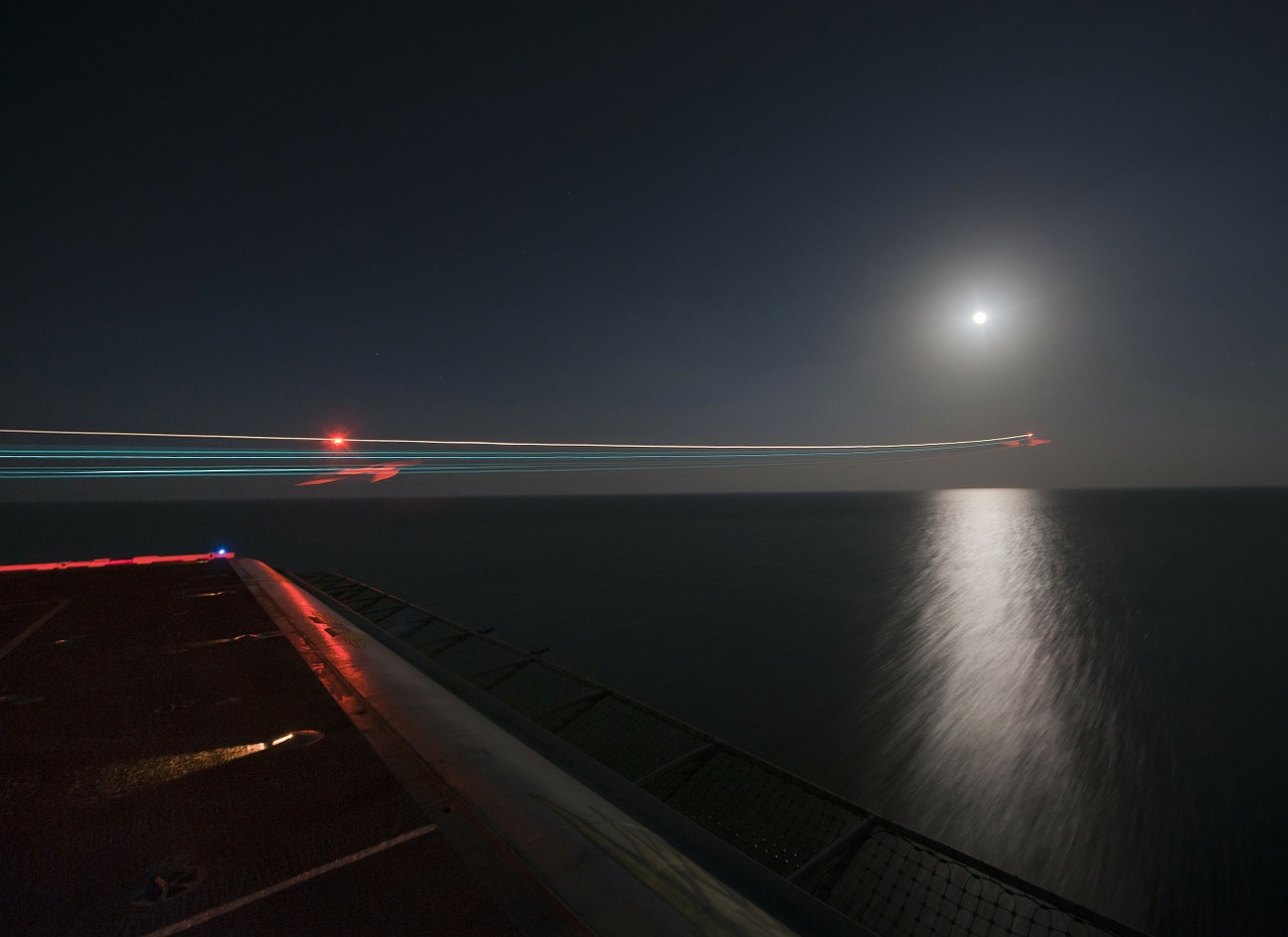 night aircraft carrier ship free photo