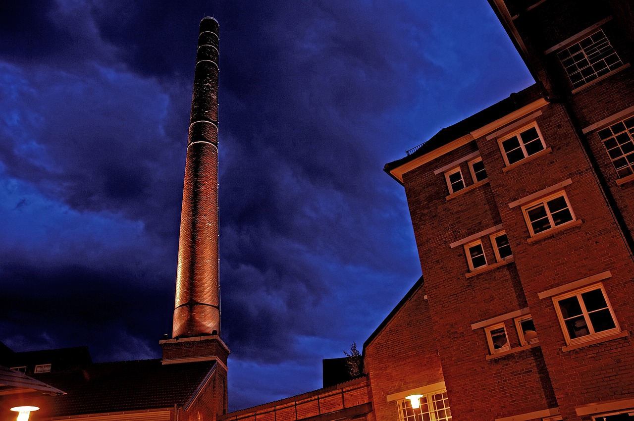night industrial building chimney free photo