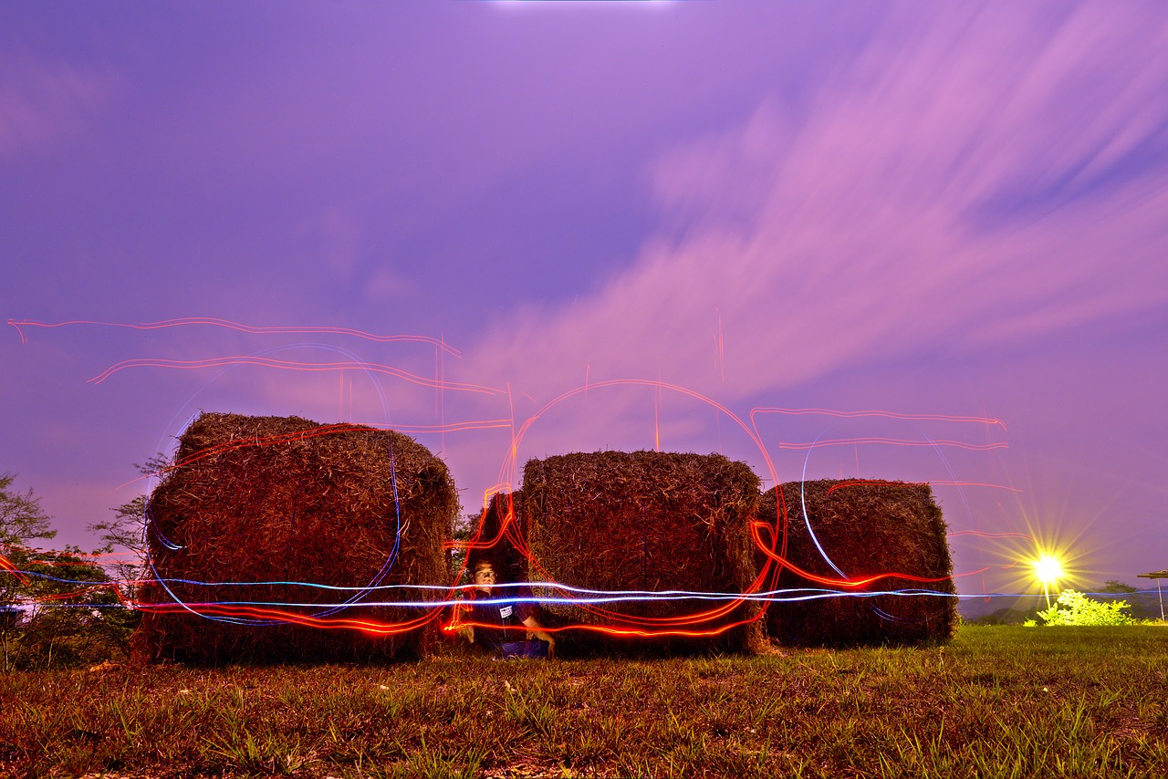 night sky  lights  hay bales free photo