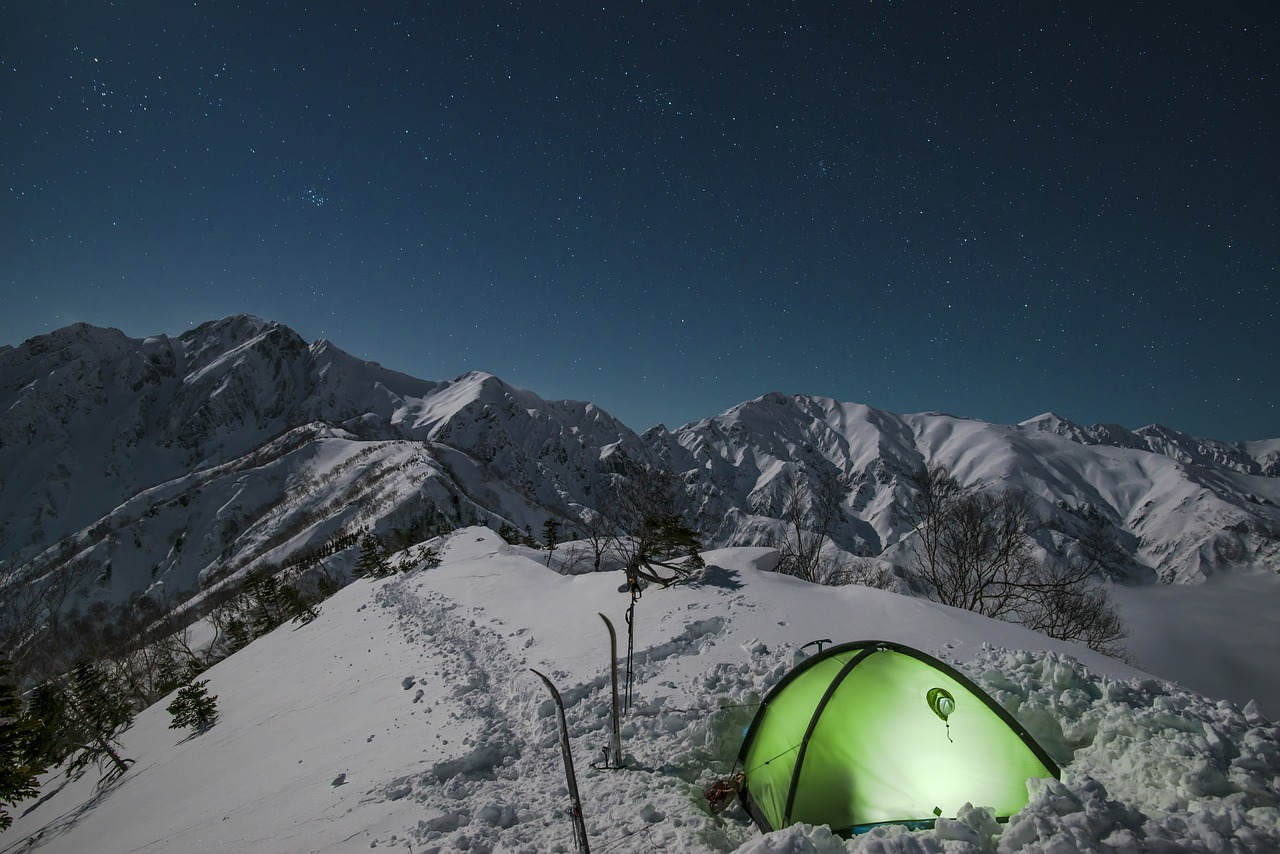 night view snow mountain tent free photo