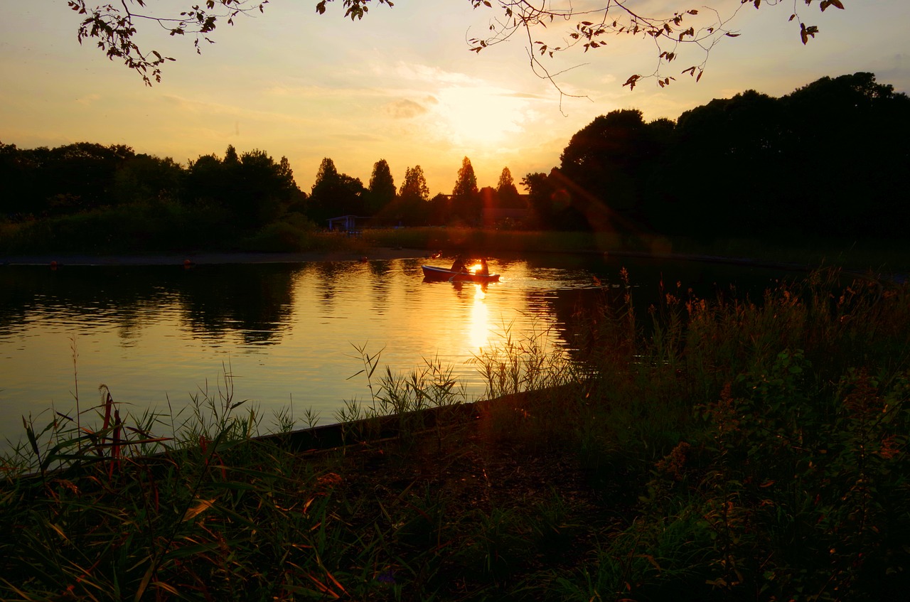 nightfall boat two people free photo