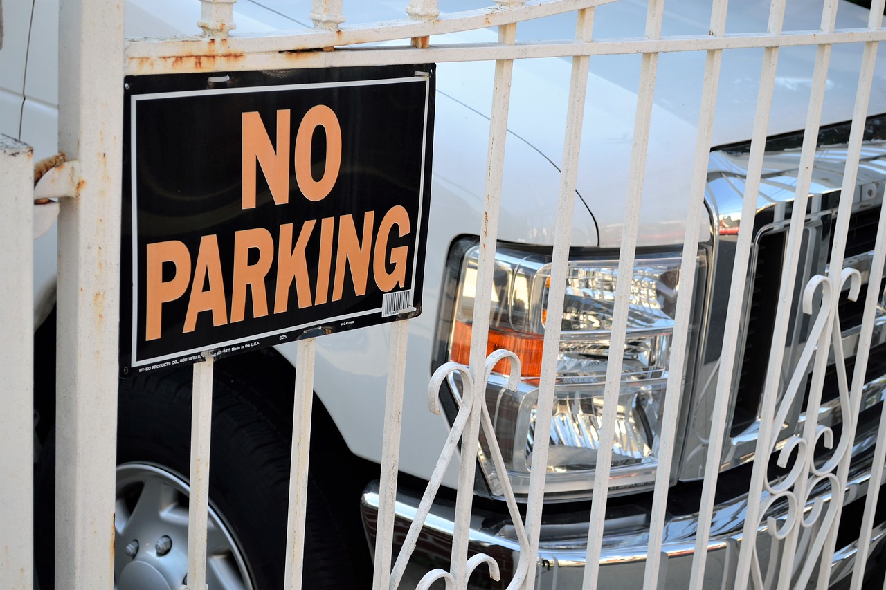 no parking sign parked suv sports utility vehicle free photo