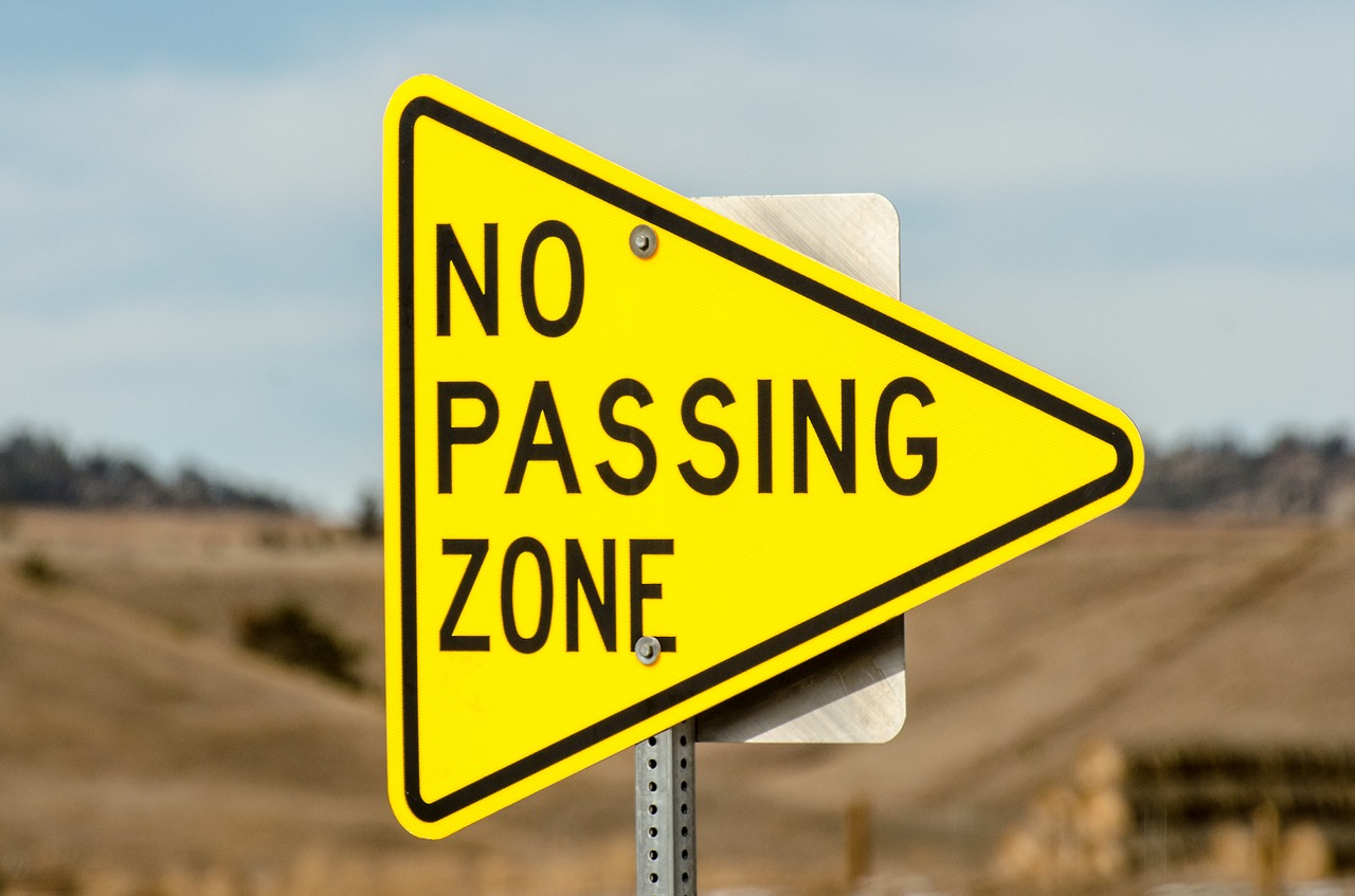 no passing zone sign triangle free photo