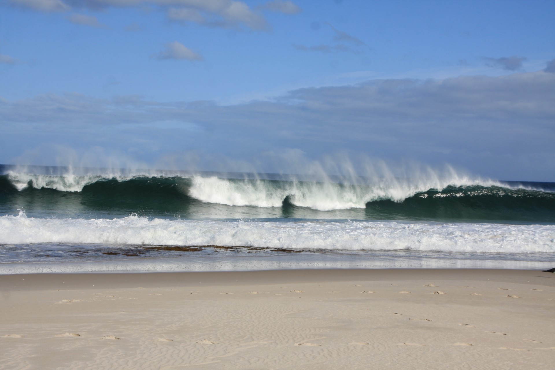 wave breaking beach free photo