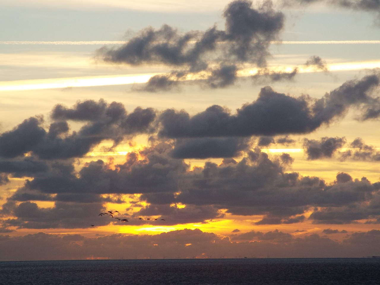 north sea clouds sunset free photo