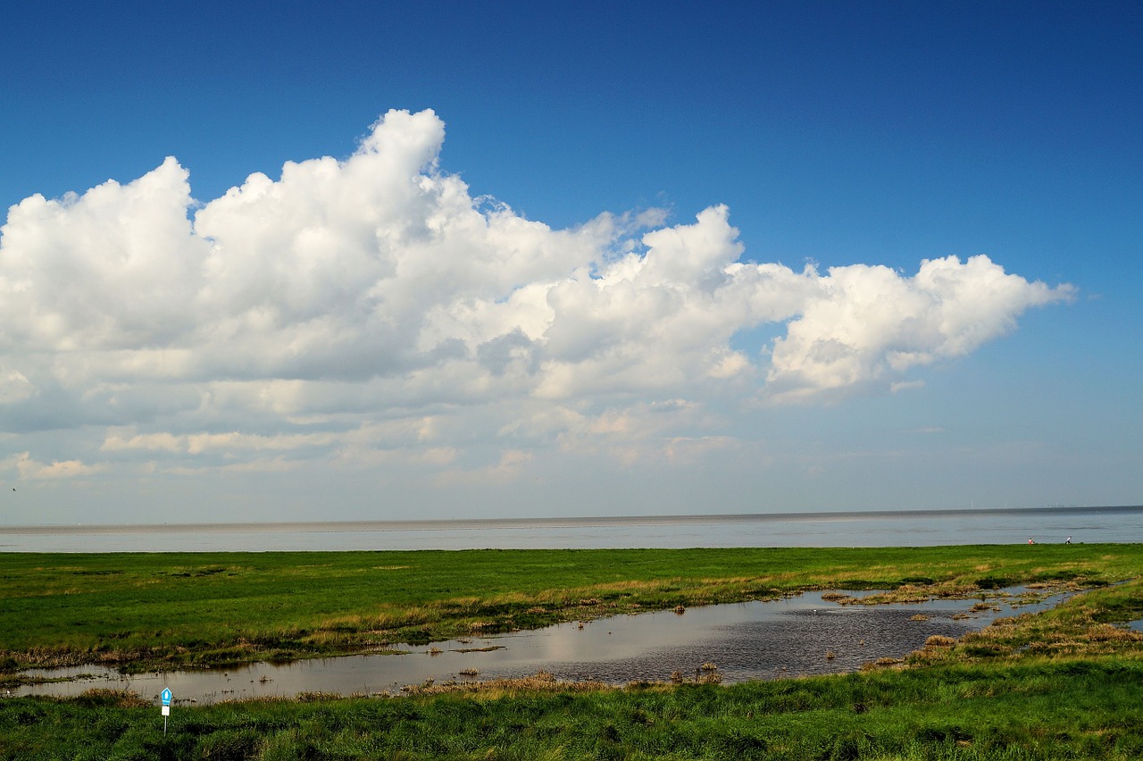 north sea sun clouds free photo