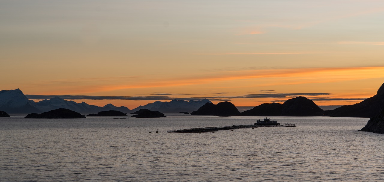 norway coast sunset rocky islands water free photo