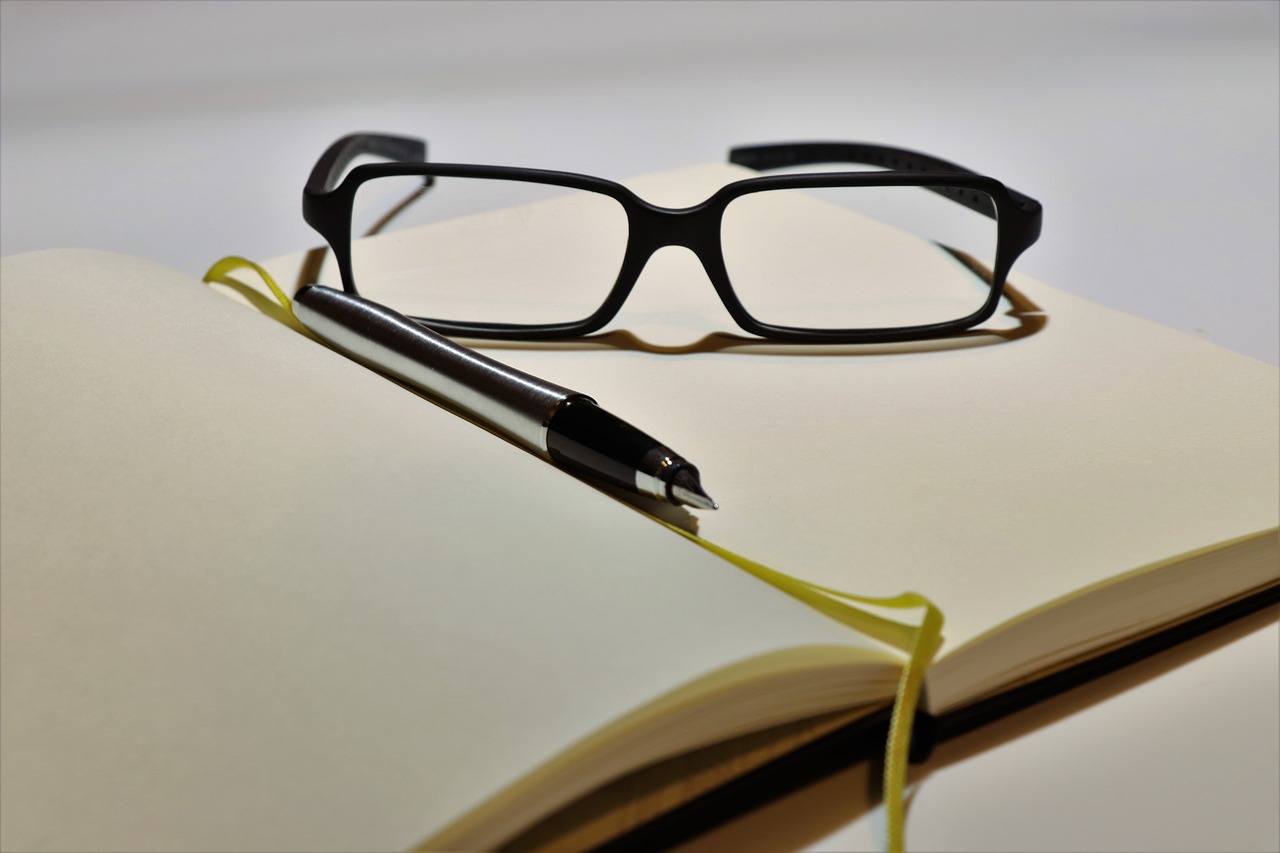 notebook  glasses  business free photo