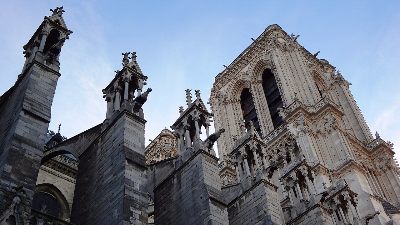 notre dame church tower gargoyles free photo